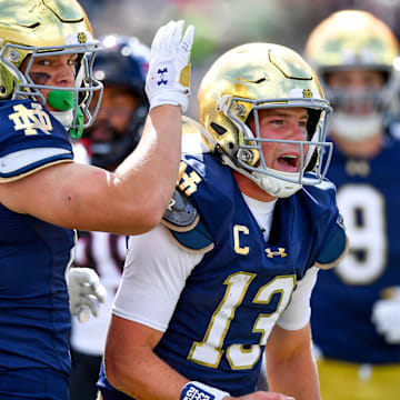 Notre Dame Fighting Irish quarterback Riley Leonard (13) celebrates 