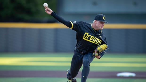 Oregon right-handed pitcher Brock Moore throws out a pitch as the Oregon Ducks host the Oregon State Beavers