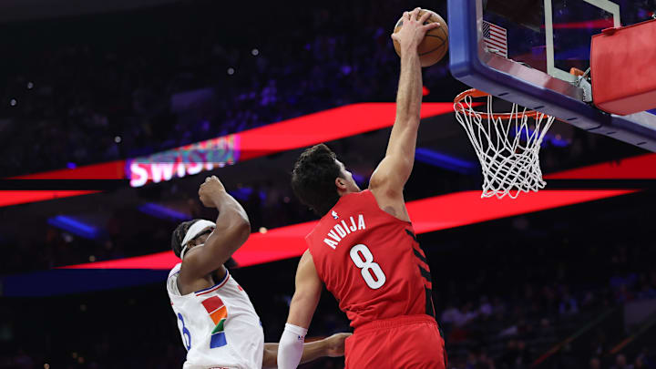 Mar 3, 2025; Philadelphia, Pennsylvania, USA; Portland Trail Blazers forward Deni Avdija (8) dunks the ball in front of Philadelphia 76ers forward Guerschon Yabusele (28) during the third quarter at Wells Fargo Center. Mandatory Credit: Bill Streicher-Imagn Images
