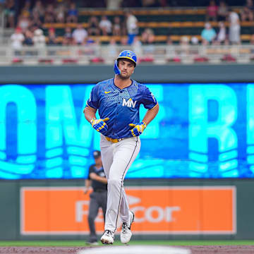 Aug 8, 2025; Minneapolis, Minnesota, USA; Minnesota Twins outfielder Matt Wallner (38) hits a home run against the Kansas City Royals in the first inning at Target Field. Mandatory Credit: Brad Rempel-Imagn Images