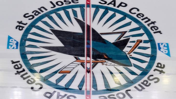 Oct 1, 2025; San Jose, California, USA; The San Jose Sharks logo at center ice commemorating the 35th anniversary season before a preseason game between the San Jose Sharks and the Anaheim Ducks at SAP Center at San Jose. Oct 1, 2025; San Jose, California, USA; The San Jose Sharks logo at center ice commemorating the 35th anniversary season before a preseason game between the San Jose Sharks and the Anaheim Ducks at SAP Center at San Jose.