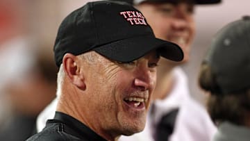 Dec 27, 2024; Memphis, TN, USA; Texas Tech Red Raiders head coach Joey McGuire looks on during warm ups prior to the game against the Arkansas Razorbacks at Simmons Bank Liberty Stadium. Mandatory Credit: Petre Thomas-Imagn Images