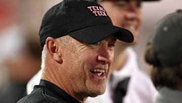 Dec 27, 2024; Memphis, TN, USA; Texas Tech Red Raiders head coach Joey McGuire looks on during warm ups prior to the game against the Arkansas Razorbacks at Simmons Bank Liberty Stadium. Mandatory Credit: Petre Thomas-Imagn Images