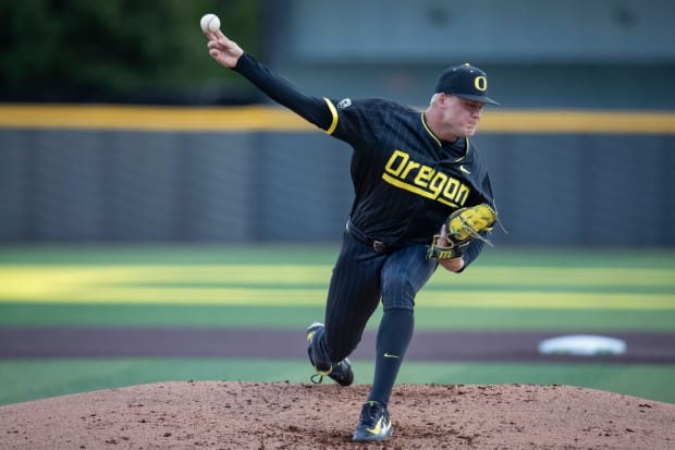 Oregon right-handed pitcher Brock Moore throws out a pitch as the Oregon Ducks host the Oregon State Beavers.