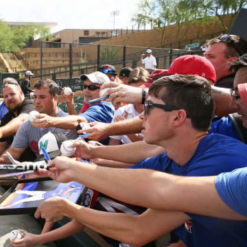 The Surprise Saguaros? Vladimir Guerrero Jr. signs autographs before an Arizona Fall League game on Oct. 23 at Salt River Fields. Guerrero is the son of Baseball Hall of Famer Vlad Guerrero Sr. 
 Photos by Rob Schumacher/The Republic
Surprise Saguaros Vladimir Guerrero Jr. signs autographs before during a game Oct. 23 at Salt River Fields at Talking Stick.

Arizona Fall League