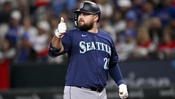 May 2, 2025; Arlington, Texas, USA; Seattle Mariners first baseman Rowdy Tellez (23) motions to the dugout after he hits a single against the Texas Rangers during the second inning at Globe Life Field. Mandatory Credit: Jerome Miron-Imagn Images