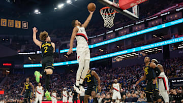 Nov 21, 2025; San Francisco, California, USA; Portland Trail Blazers guard Caleb Love (2) shoots the ball against Golden State Warriors guard Brandin Podziemski (2) during the second quarter at Chase Center.