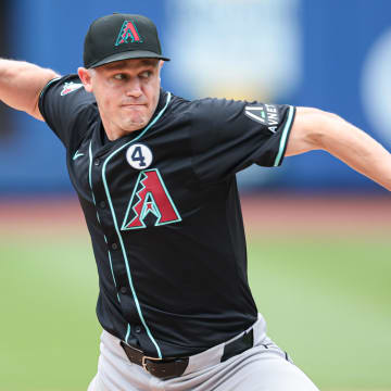 Jun 2, 2024; New York City, New York, USA; Arizona Diamondbacks relief pitcher Paul Sewald (38) delivers a pitch during the ninth inning against the New York Mets at Citi Field. Mandatory Credit: Vincent Carchietta-USA TODAY Sports
