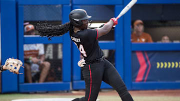Jun 4, 2025; Oklahoma City, OK, USA;  Texas Tech Red Raiders pitcher NiJaree Canady (24) fouls the ball in the fourth inning against the Texas Longhorns during game one of the NCAA Softball Women's College World Series finals at Devon Park. Mandatory Credit: Brett Rojo-Imagn Images