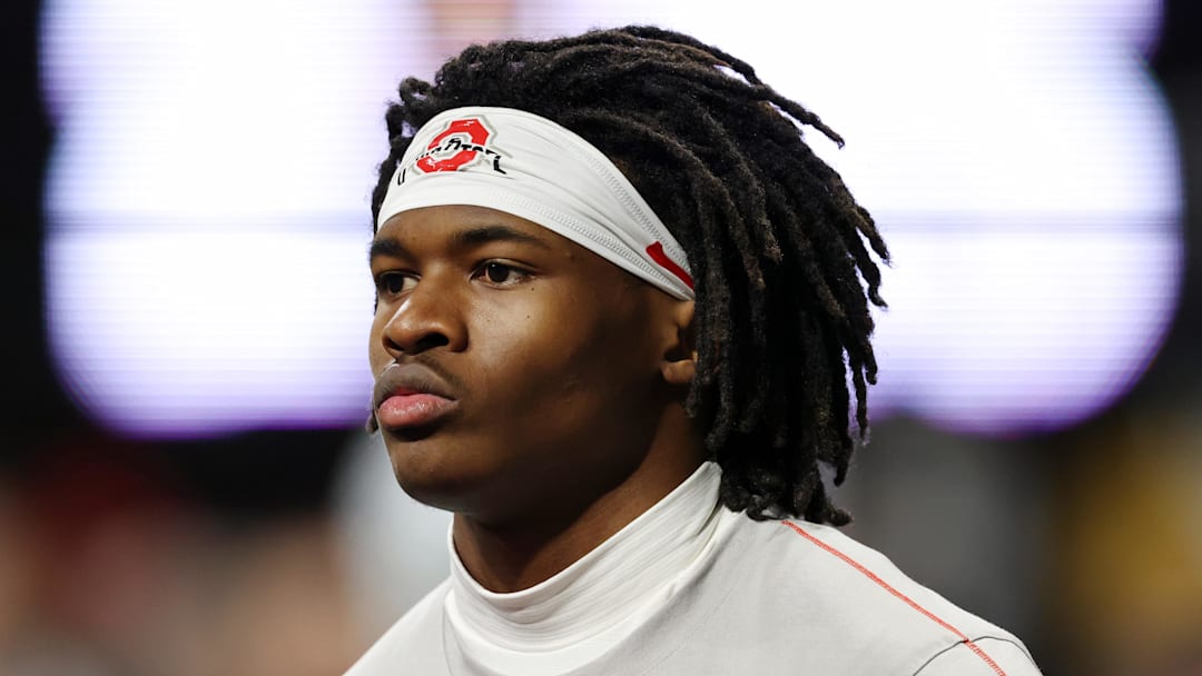 Jan 20, 2025; Atlanta, GA, USA; Ohio State Buckeyes wide receiver Jeremiah Smith (4) warms up before the CFP National Championship college football game at Mercedes-Benz Stadium. Mandatory Credit: Brett Davis-Imagn Images