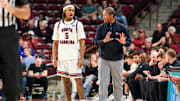 Nov 12, 2025; Columbia, South Carolina, USA; South Carolina Gamecocks head coach Lamont Paris speaks with guard Meechie Johnson (5) against the Presbyterian Blue Hose in the second half at Colonial Life Arena. Mandatory Credit: Jeff Blake-Imagn Images