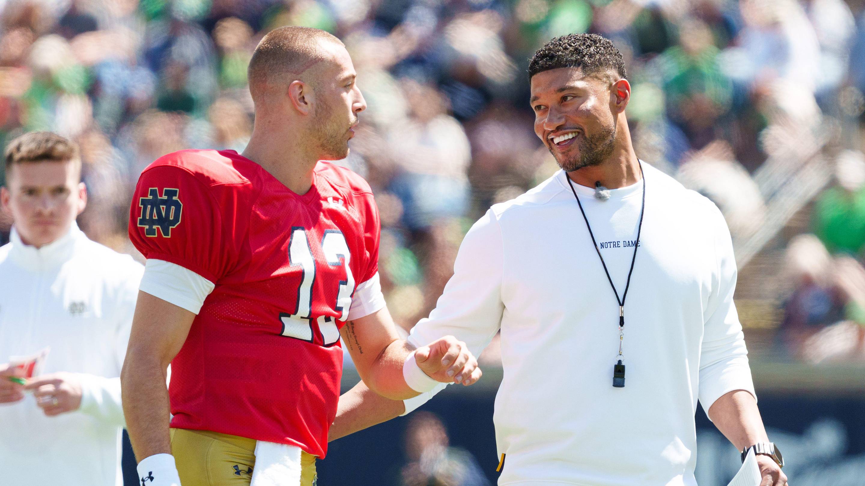 Notre Dame quarterback CJ Carr (13) and head coach Marcus Freeman during the Blue-Gold spring game at Notre Dame Stadium on Saturday, April 25, 2026, in South Bend.