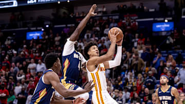 Nov 3, 2024; New Orleans, Louisiana, USA;  Atlanta Hawks forward Jalen Johnson (1) drives to the basket against New Orleans Pelicans guard Javonte Green (4) during the first half at Smoothie King Center. Mandatory Credit: Stephen Lew-Imagn Images