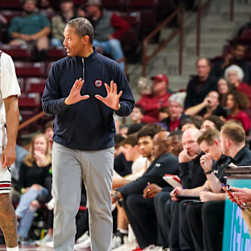 Nov 12, 2025; Columbia, South Carolina, USA; South Carolina Gamecocks head coach Lamont Paris speaks with guard Meechie Johnson (5) against the Presbyterian Blue Hose in the second half at Colonial Life Arena. Mandatory Credit: Jeff Blake-Imagn Images