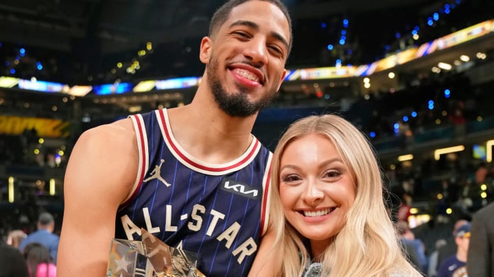 Eastern Conference guard Tyrese Haliburton (0) of the Indiana Pacers and girlfriend Jade Jones after the 73rd NBA All Star game at Gainbridge Fieldhouse.