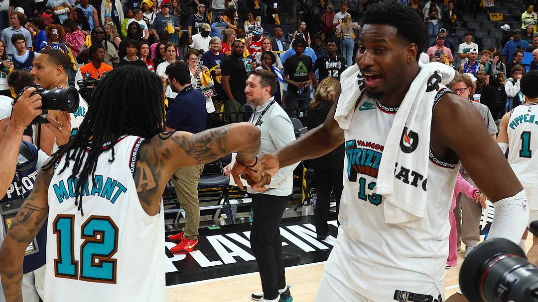 Apr 18, 2025; Memphis, Tennessee, USA; Memphis Grizzlies guard Ja Morant (12) and forward Jaren Jackson Jr. (13) react after defeating the Dallas Mavericks at FedExForum. Mandatory Credit: Petre Thomas-Imagn Images Apr 18, 2025; Memphis, Tennessee, USA; Memphis Grizzlies guard Ja Morant (12) and forward Jaren Jackson Jr. (13) react after defeating the Dallas Mavericks at FedExForum. Mandatory Credit: Petre Thomas-Imagn Images