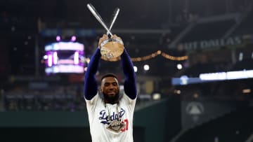 Jul 15, 2024; Arlington, TX, USA; National League outfielder Teoscar Hernandez of the Los Angeles Dodgers (37) poses with the trophy after winning the 2024 Home Run Derby at Globe Life Field: Kevin Jairaj-USA TODAY Sports