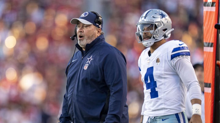 October 8, 2023; Santa Clara, California, USA; Dallas Cowboys head coach Mike McCarthy (left) and quarterback Dak Prescott (4) watch against the San Francisco 49ers during the first quarter at Levi's Stadium. Mandatory Credit: Kyle Terada-Imagn Images