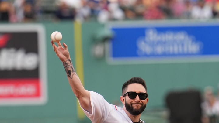 Jared Carrabis from Draftkings throws out the first pitch prior to the game between the New York Yankees and Boston Red Sox at Fenway Park in 2022.