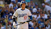 Oct 9, 2025; Los Angeles, California, USA; Los Angeles Dodgers designated hitter Shohei Ohtani (17) prepares to bat in the first inning against the Philadelphia Phillies during game four of the NLDS round for the 2025 MLB playoffs at Dodger Stadium. Mandatory Credit: Jayne Kamin-Oncea-Imagn Images