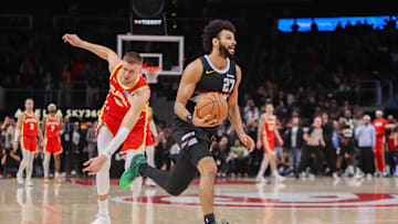 Dec 5, 2025; Atlanta, Georgia, USA; Denver Nuggets guard Jamal Murray (27) drives to the basket against the Atlanta Hawks in the fourth quarter at State Farm Arena. Mandatory Credit: Brett Davis-Imagn Images