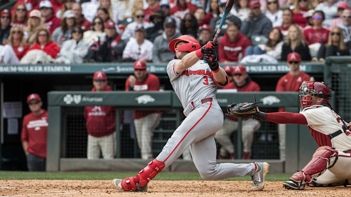 Apr 18, 2026; Fayetteville, AR, USA; Georgia Bulldogs catcher Daniel Jackson (3) hits a single during the fourth inning against the Arkansas Razorbacks at Baum-Walker Stadium. Georgia won 26-14. Mandatory Credit: Brett Rojo-Imagn Images