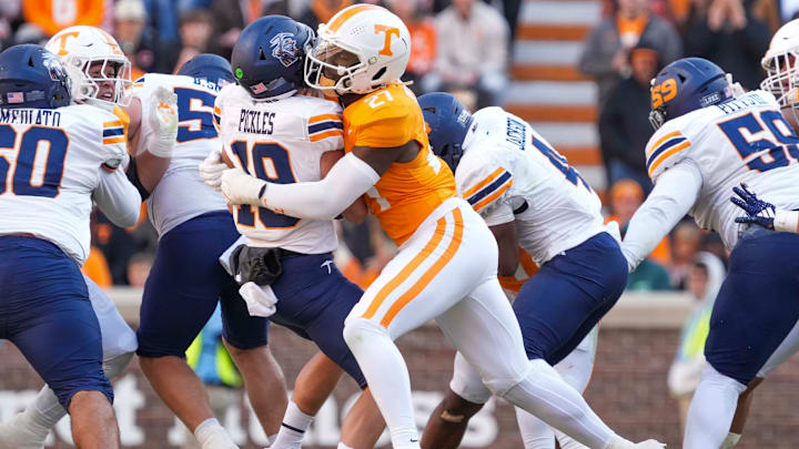 SEATTLE SEAHAWKS: Tennessee defensive lineman James Pearce Jr. (27) sacks UTEP quarterback JP Pickles (19) during a NCAA football game between Tennessee and UTEP in Neyland Stadium on Saturday, November 23, 2024.