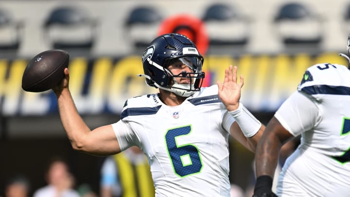 Aug 10, 2024; Inglewood, California, USA; Seattle Seahawks quarterback Sam Howell (6) throws a pass against the Los Angeles Chargers during the first quarter at SoFi Stadium. Mandatory Credit: Jonathan Hui-USA TODAY Sports