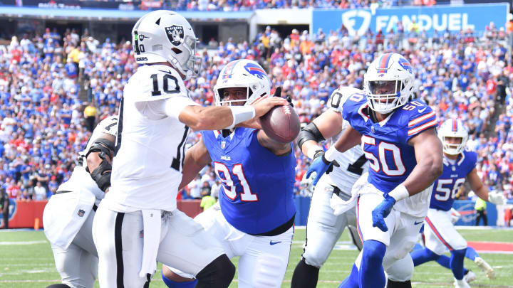 Sep 17, 2023; Orchard Park, NY; Buffalo Bills defensive tackle Ed Oliver (91) and defensive end Greg Rousseau (50) pressure Las Vegas Raiders quarterback Jimmy Garoppolo (10) in the second quarter at Highmark Stadium.  