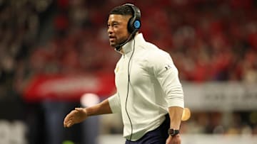 Jan 20, 2025; Atlanta, GA, USA; Notre Dame Fighting Irish head coach Marcus Freeman looks on against the Ohio State Buckeyes during the first half the CFP National Championship college football game at Mercedes-Benz Stadium. Mandatory Credit: Mark J. Rebilas-Imagn Images