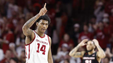 Mar 2, 2024; Norman, Oklahoma, USA; Oklahoma Sooners forward Jalon Moore (14) gestures after scoring against Houston. 