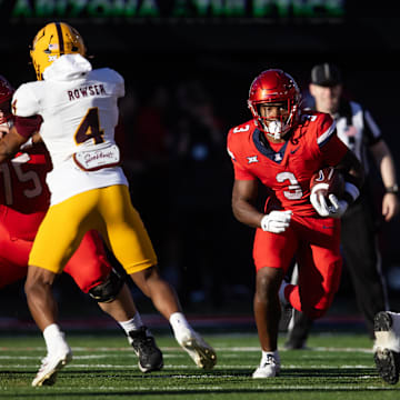 Nov 30, 2024; Tucson, Arizona, USA; Arizona Wildcats running back Kedrick Reescano (3) against the Arizona State Sun Devils in the second half during the Territorial Cup at Arizona Stadium. Mandatory Credit: Mark J. Rebilas-Imagn Images