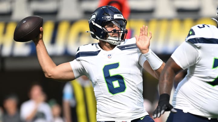 Aug 10, 2024; Inglewood, California, USA; Seattle Seahawks quarterback Sam Howell (6) throws a pass against the Los Angeles Chargers during the first quarter at SoFi Stadium. Mandatory Credit: Jonathan Hui-USA TODAY Sports