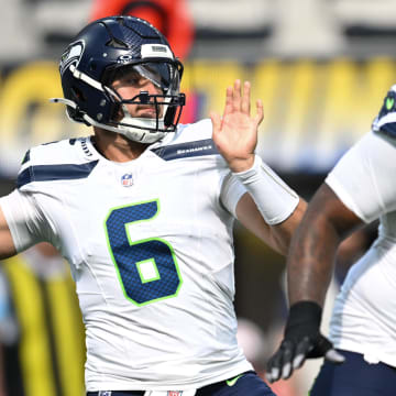 Aug 10, 2024; Inglewood, California, USA; Seattle Seahawks quarterback Sam Howell (6) throws a pass against the Los Angeles Chargers during the first quarter at SoFi Stadium. Mandatory Credit: Jonathan Hui-USA TODAY Sports