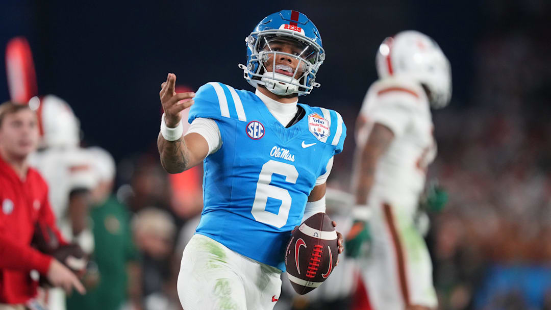 Ole Miss Rebels quarterback Trinidad Chambliss (6) signals a first down after his run against the Miami Hurricanes during their Vrbo Fiesta Bowl matchup at State Farm Stadium on Jan. 8, 2026.