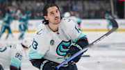 Nov 29, 2024; San Jose, California, USA; Seattle Kraken left wing Brandon Tanev (13) warms up on the ice before the game between the San Jose Sharks and the Seattle Kraken at SAP Center at San Jose. Mandatory Credit: Robert Edwards-Imagn Images