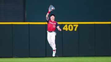 Jul 13, 2024; Arlington, TX, USA;  American League Future outfielder Max Clark (13) makes a catch during the fourth inning against the National League Future team during the Major League All-Star Futures game at Globe Life Field.