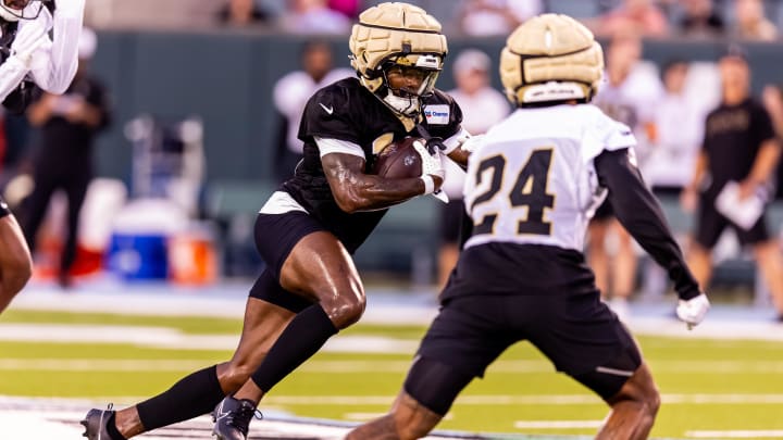 New Orleans Saints wide receiver Bub Means (16) rushes away from safety Johnathan Abram (24) during practice at Yulman Stadium