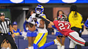 Nov 23, 2025; Inglewood, California, USA; Los Angeles Rams wide receiver Davante Adams (17) catches a twenty-four touchdown pass thrown by quarterback Matthew Stafford (not pictured) against Tampa Bay Buccaneers cornerback Zyon McCollum (27) during the second quarter at SoFi Stadium.  Mandatory Credit: Jayne Kamin-Oncea-Imagn Images