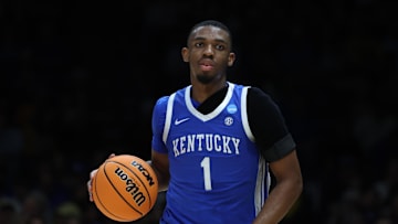 Lamont Butler (1) dribbles the ball against the Tennessee Volunteers during the 2025 NCAA tournament. 