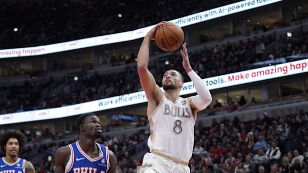 Chicago Bulls guard Zach LaVine (8) shoots against Philadelphia 76ers