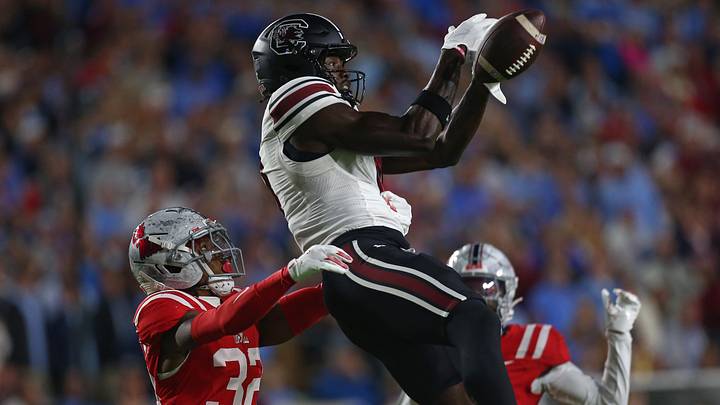 Nov 1, 2025; Oxford, Mississippi, USA; South Carolina Gamecocks wide receiver Nyck Harbor (8) attempts to catch a pass as Mississippi Rebels defensive back Chris Graves Jr. (32) defends during the first quarter at Vaught-Hemingway Stadium. Mandatory Credit: Petre Thomas-Imagn Images