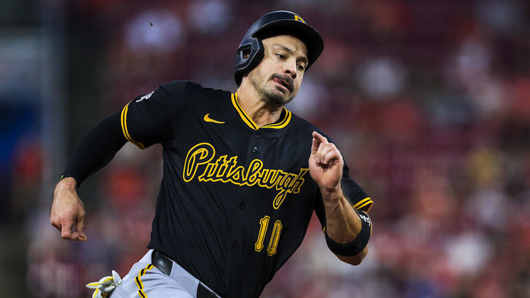 Sep 24, 2025; Cincinnati, Ohio, USA; Pittsburgh Pirates outfielder Bryan Reynolds (10) scores on a double hit by first baseman Spencer Horwitz (not pictured) in the fourth inning against the Cincinnati Reds at Great American Ball Park. M