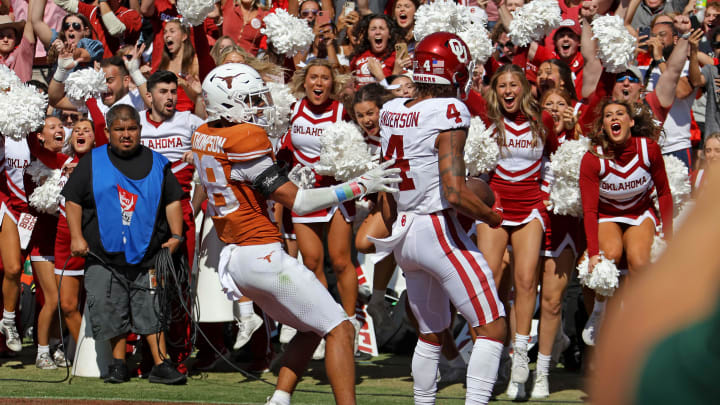 Oklahoma Sooners wide receiver Nic Anderson (4) celebrates a touchdown beside Texas Longhorns defensive back Jerrin Thompson (28) late in the fourth quarter during the Red River Rivalry college football game between the University of Oklahoma Sooners (OU) and the University of Texas (UT) Longhorns at the Cotton Bowl in Dallas, Saturday, Oct. 7, 2023. Oklahoma won 34-30.