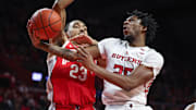 Rutgers Scarlet Knights guard Jeremiah Williams (25) drives for a shot against Ohio State Buckeyes forward Zed Key (23) during the second half at Jersey Mike's Arena.