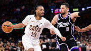 Apr 6, 2025; Cleveland, Ohio, USA; Cleveland Cavaliers guard Darius Garland (10) drives to the basket against Sacramento Kings guard Zach LaVine (8) during the second half at Rocket Arena. Mandatory Credit: Ken Blaze-Imagn Images