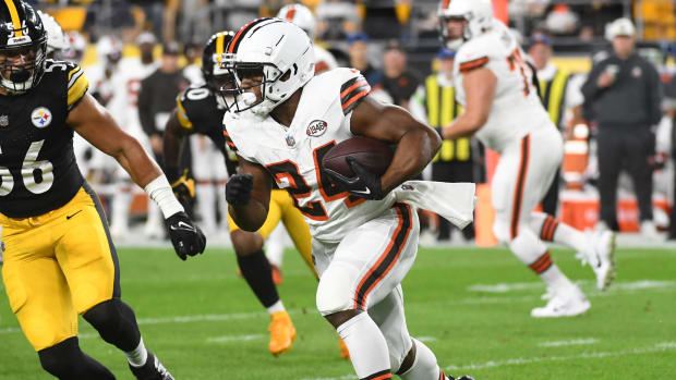 Nick Chubb running for a first down