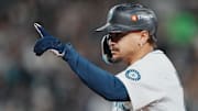 Oct 16, 2025; Seattle, Washington, USA; Seattle Mariners first baseman Josh Naylor (12) reacts after hitting a single against the Toronto Blue Jays in the fourth inning during game four of the ALCS round for the 2025 MLB playoffs at T-Mobile Park. Mandatory Credit: Stephen Brashear-Imagn Images