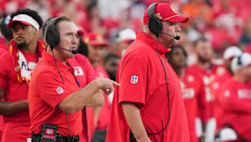 Aug 22, 2024; Kansas City, Missouri, USA; Kansas City Chiefs defensive coordinator Steve Spagnuolo, left and head coach Andy Reid watch play against the Chicago Bears during the game at GEHA Field at Arrowhead Stadium. Mandatory Credit: Denny Medley-Imagn Images