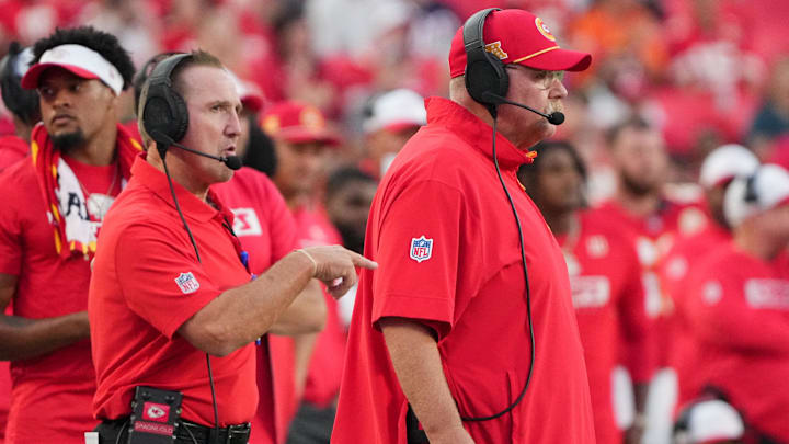 Aug 22, 2024; Kansas City, Missouri, USA; Kansas City Chiefs defensive coordinator Steve Spagnuolo, left and head coach Andy Reid watch play against the Chicago Bears during the game at GEHA Field at Arrowhead Stadium. Mandatory Credit: Denny Medley-Imagn Images